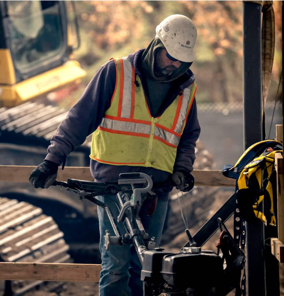 A construction worker in safety gear on a McGough job site