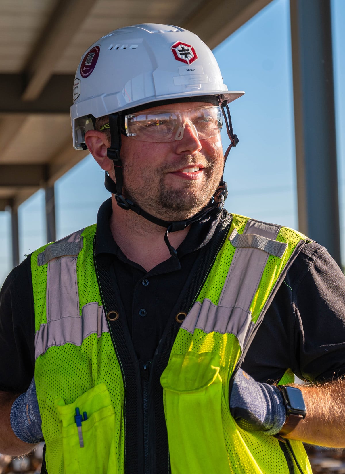 McGough safety engineer speaking to a group of construction workers on a job site