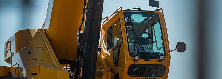 A construction worker in safety gear on the site of a McGough construction project,