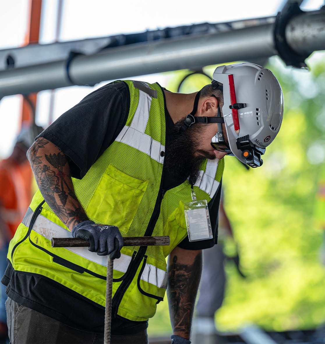 A construction worker in safety gear on a McGough job site