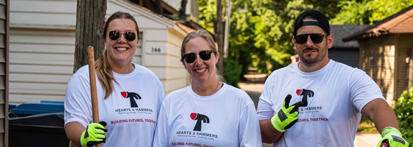 Two McGough employees volunteering on a community project