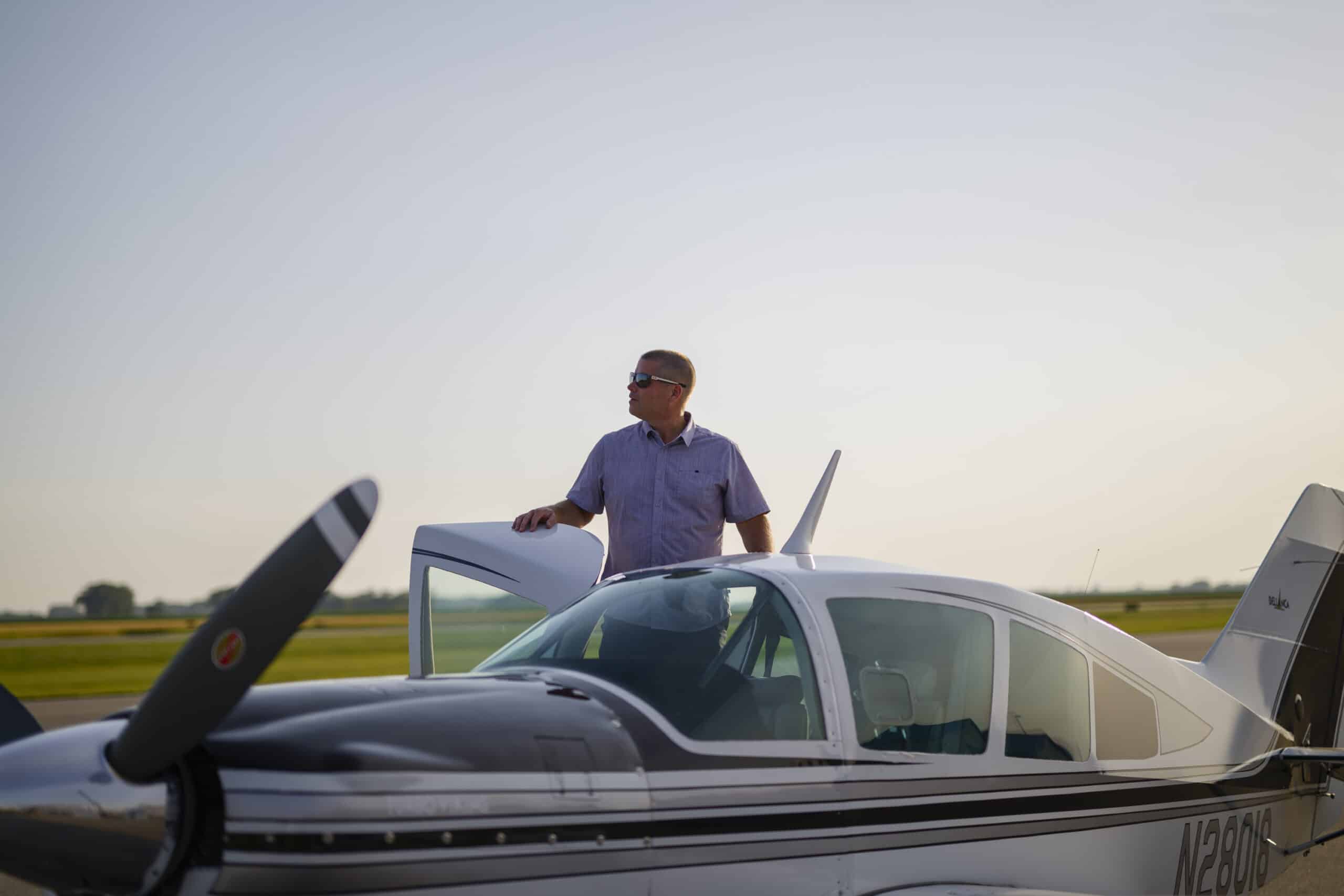 Derek entering his plane